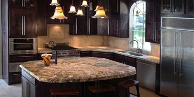 Right at the start, we decided that the focal point of the kitchen would be the island. At that time we were unsure about what material we would use for the island top, so we went on a quest. We spent several days visiting virtually all of the natural stone distributors in the Dallas/Ft. Worth area